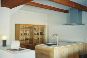 Design Condo, Pets Allowed | Private kitchen | Electric kettle