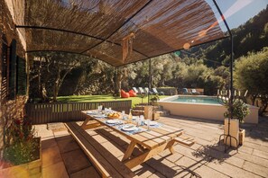 Outdoor dining - Stunning 4 bedroom Villa in Deià with salt walter pool, large garden & sea view  (Palma)