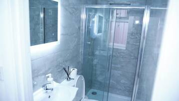 Shower, free toiletries, hair dryer, towels