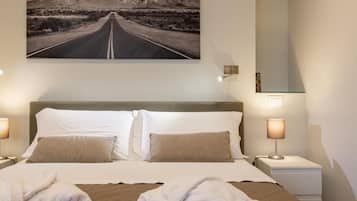 5 slaapkamers, een strijkplank/strijkijzer, beddengoed