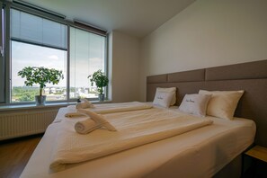 Flora Cozy Apartment by CHORS | 1 chambre, matelas Select Comfort, bureau, rideaux occultants