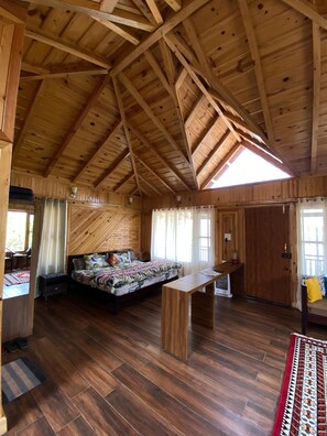 Interior - A wooden cottage in an fruits orchard facing Himalayas 
 (Ramgarh)