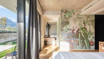 Doppia Superior | Copriletto in piuma, minibar, una cassaforte in camera