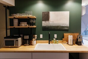 Fridge, microwave, coffee/tea maker, toaster