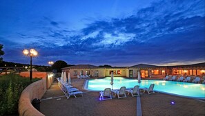 Seasonal outdoor pool, pool umbrellas, pool loungers