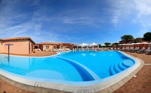 Seasonal outdoor pool, pool umbrellas, pool loungers
