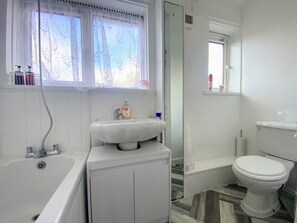Hair dryer, towels, soap, shampoo