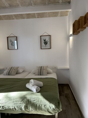 2 bedrooms, travel crib, WiFi, bed sheets