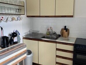 Cottage | Private kitchen | Fridge, microwave, oven, stovetop