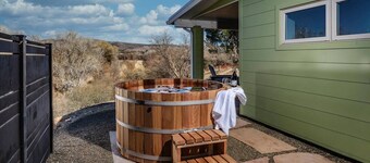 Cool off at our modern eco-retreat this summer, where creek access provides 20°F relief from Phoenix