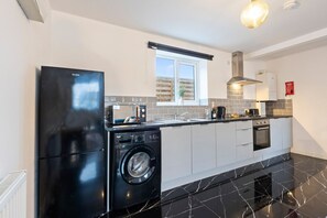 Fridge, microwave, oven, stovetop - There is 1 bedroom with 1 small double bed, able to comfortably accommodate 2 guests. (Cradley Heath)