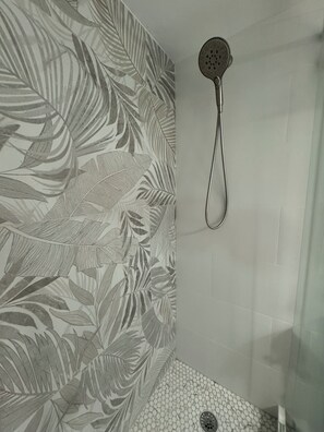 Shower, eco-friendly toiletries, hair dryer, towels