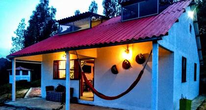 Hermosa cabaña con un bello mirador, llena de tranquilidad y confort