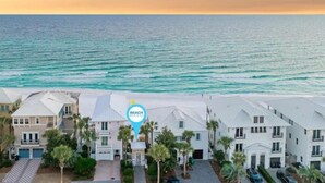 A beachfront property with a prominent beach icon, indicating a beach location.