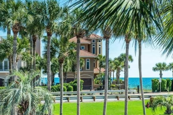 Soak in the tropical vibe with the palm lined views of our luxe villas.
