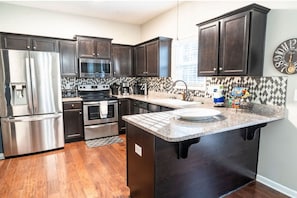 Fridge, microwave, oven, stovetop - Beautiful home in Fort Mill near Carowinds, Ballantyne, BMX, Charlotte NC (Fort Mill)