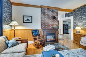 TV, fireplace, books