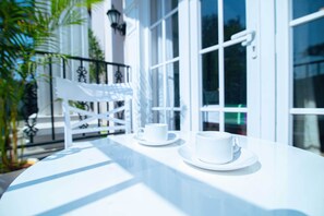 Deluxe Room with Pool View | 1 bedroom, individually furnished, desk, blackout drapes