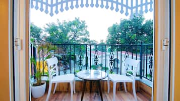 Deluxe Room with Pool View | Individually furnished, desk, blackout curtains, iron/ironing board