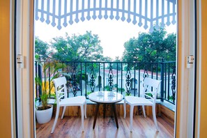 Deluxe Room with Pool View | Individually furnished, desk, blackout curtains, iron/ironing board