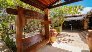 A wooden sign with the text "Pousada Rancho das Dunas" indicating a lodging area. - Hotel Pousada Rancho das Dunas (Santo Amaro do Maranhão)