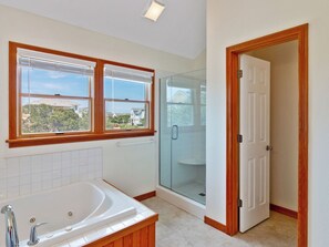 Shower, jetted tub, towels
