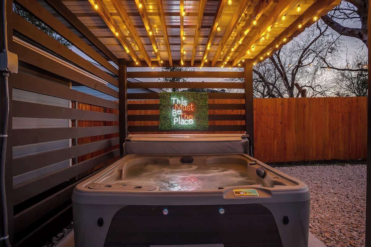 Slip into the bubbling hot tub and let the day's stress melt away under the glow of string lights. Whether you're enjoying a peaceful solo soak or sharing laughs with friends, this cozy retreat is the perfect way to unwind and recharge.
