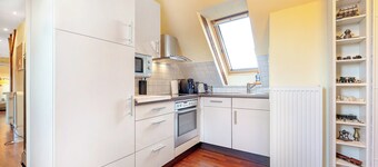 Holiday Apartment 'Dachgeschosswohnung Wohllebe' with Wi-Fi and Air Conditioning