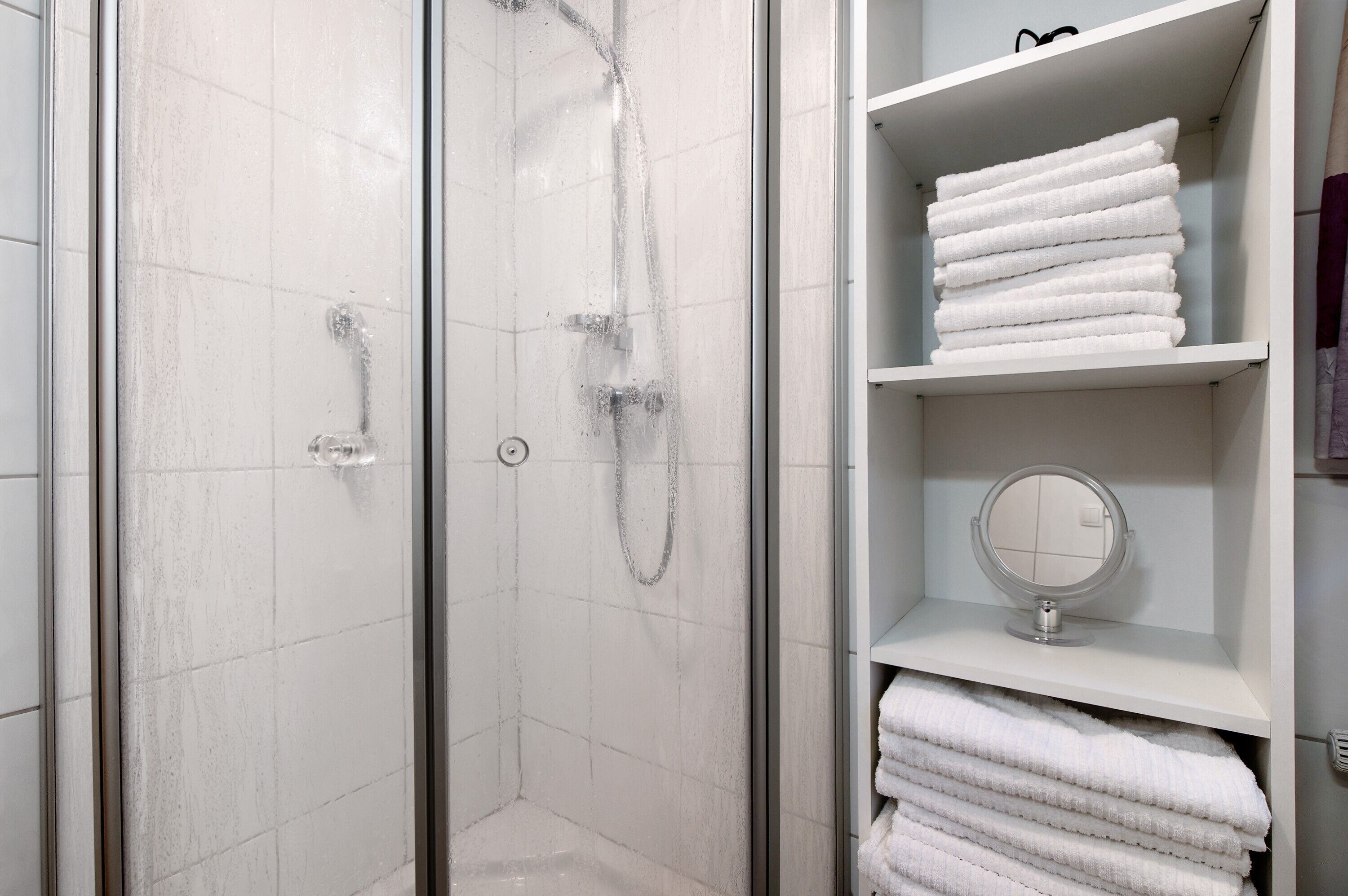 Shower, free toiletries, hair dryer, towels