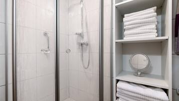 Shower, free toiletries, hair dryer, towels