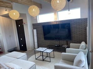 Executive Suite, 2 Bedrooms | Living room | 60-inch flat-screen TV with digital channels, DVD player, computer