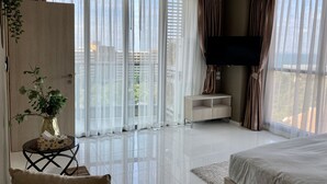 Condo Deluxe, quang cảnh biển | 1 phòng ngủ, truy cập Internet không dây miễn phí, bộ trải giường 