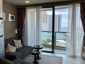 Deluxe Condo, Sea View | Living area - The Cloud by PSR (Pattaya)