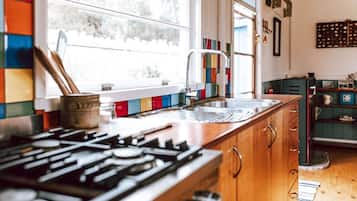 Fridge, microwave, stovetop, coffee/tea maker