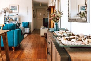 TV, fireplace, books