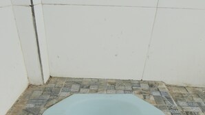 Deluxe Double Room | Bathroom | Shower, towels, soap - OYO Life 93156 Rumah Kosan (Janapria)