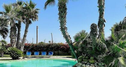 Villa Adelaide: A welcoming two-story villa situated at a few steps from a sandy beach, with Free WI-FI.