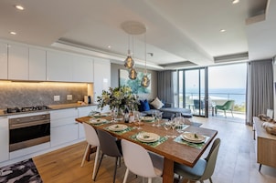 Apartment, 4 Bedrooms | Living area | Flat-screen TV