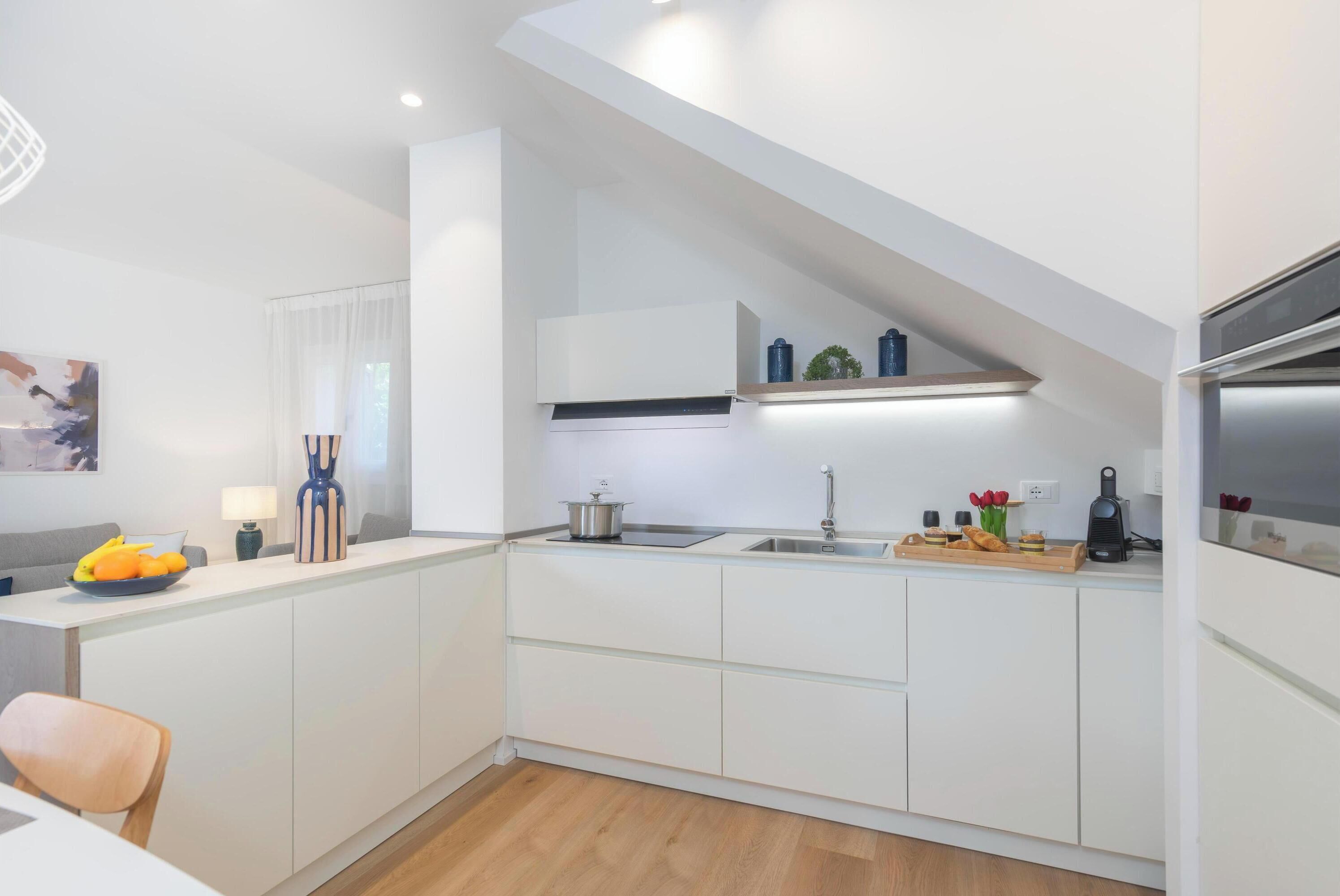 Family Apartment, Multiple Bedrooms, 2 Bathrooms (Piazzetta Albatros 50m From The Beach) | Private kitchen | Fridge, microwave, oven, stovetop