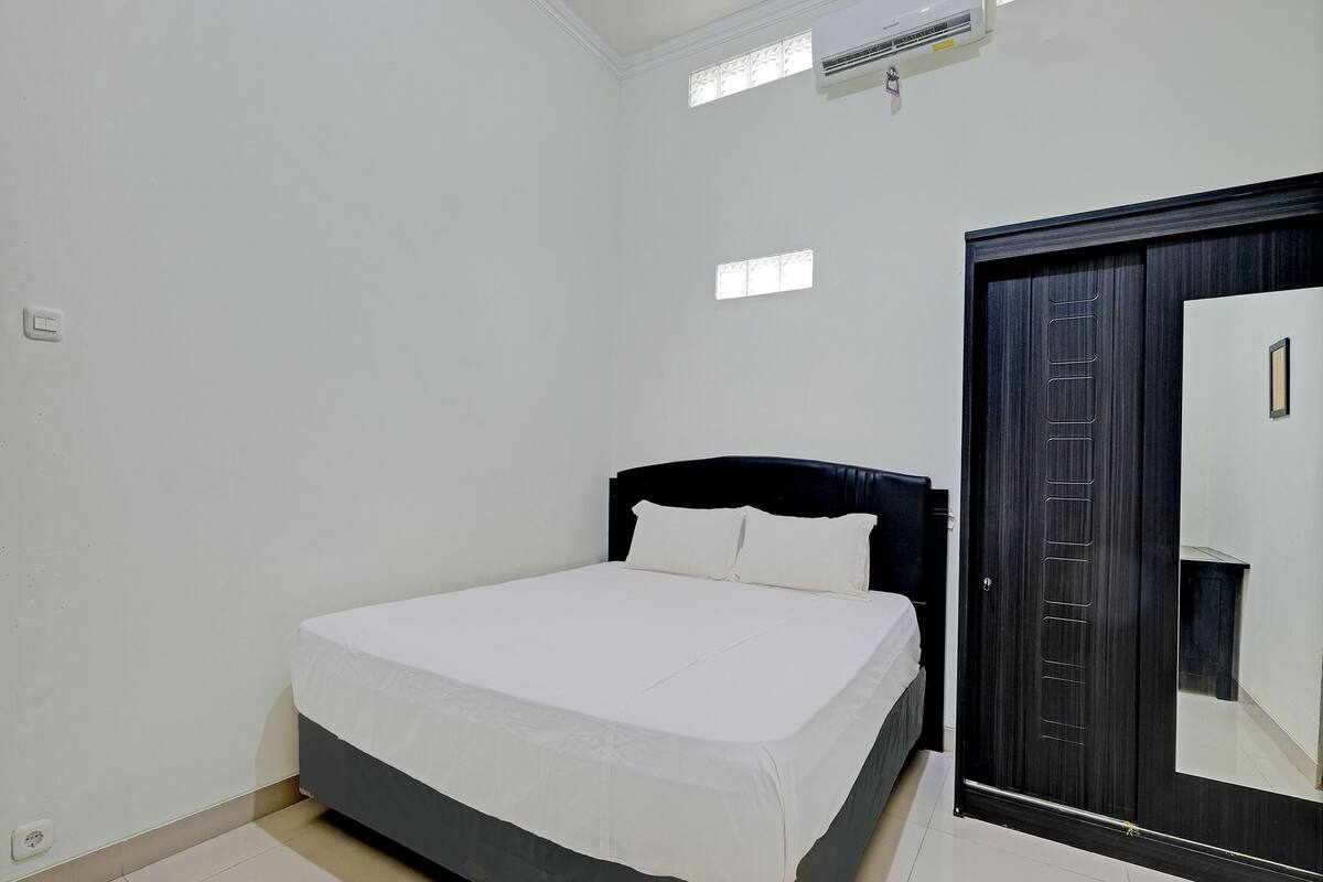 Habitación doble Deluxe | Escritorio, espacio para trabajar con laptop y ropa de cama