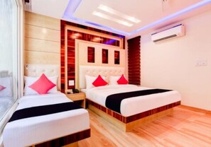 Classic Triple Room | Hypo-allergenic bedding, Select Comfort beds, individually furnished