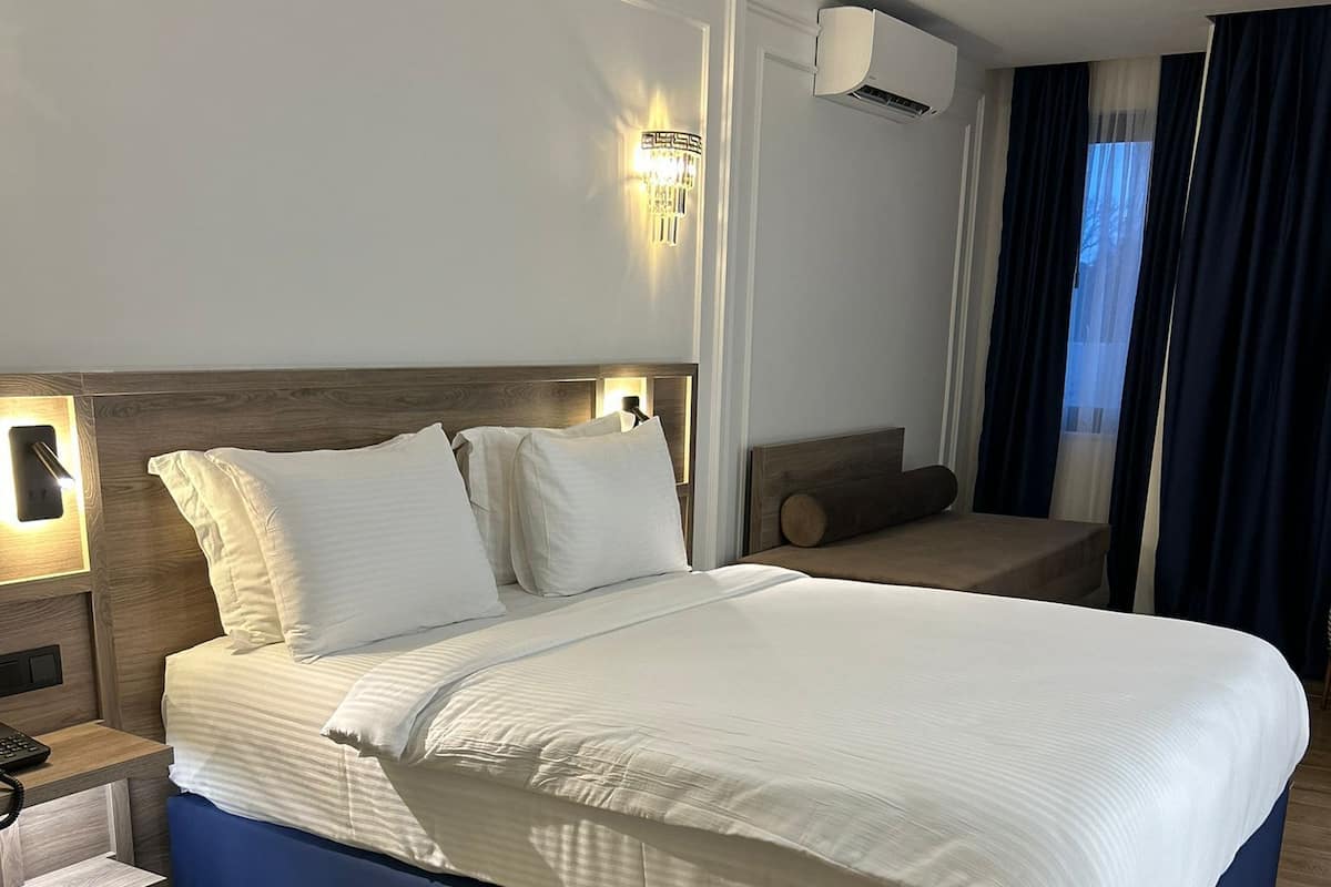 Habitación Premium, vista al jardín | 1 habitación, ropa de cama hipoalergénica y camas con efecto memoria