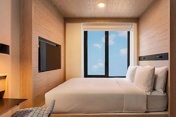 Unwind in a warm wood nook with sky views.