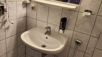 Ducha, secador de pelo, toallas