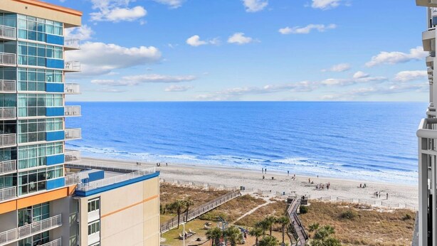A high-rise building with a view of the beach and ocean. - Oceanview at Dunes Village | 4 Beds & Waterpark (Myrtle Beach)