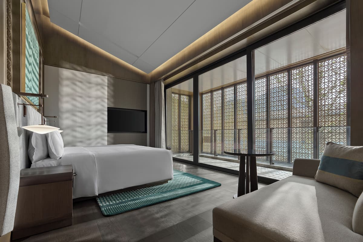 Premium bedding, down duvets, pillow-top beds, free minibar items