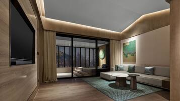 Suite, Lake View | Living area | 55-inch LED TV with cable channels, heated floors