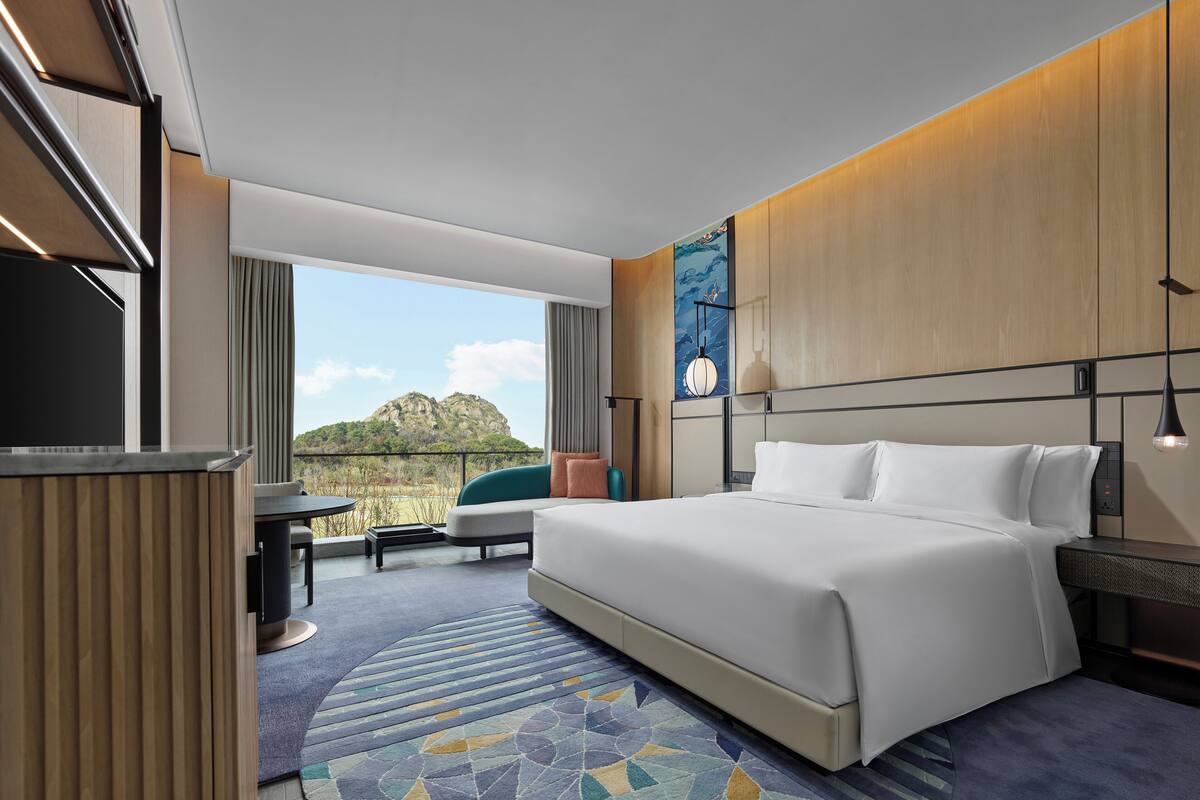 Premium bedding, down duvets, pillow-top beds, free minibar items