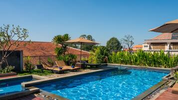 Outdoor pool, pool umbrellas, pool loungers