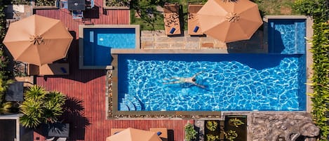 Outdoor pool, pool umbrellas, pool loungers